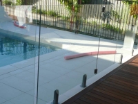 pool fencing mixture of frameless and framed